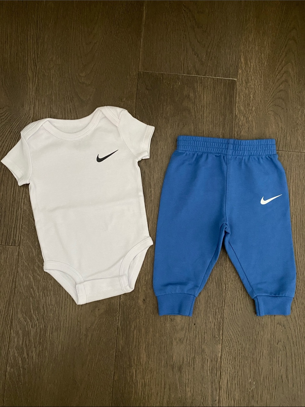 Nike White Bodysuit with Blue Joggers Baby Set